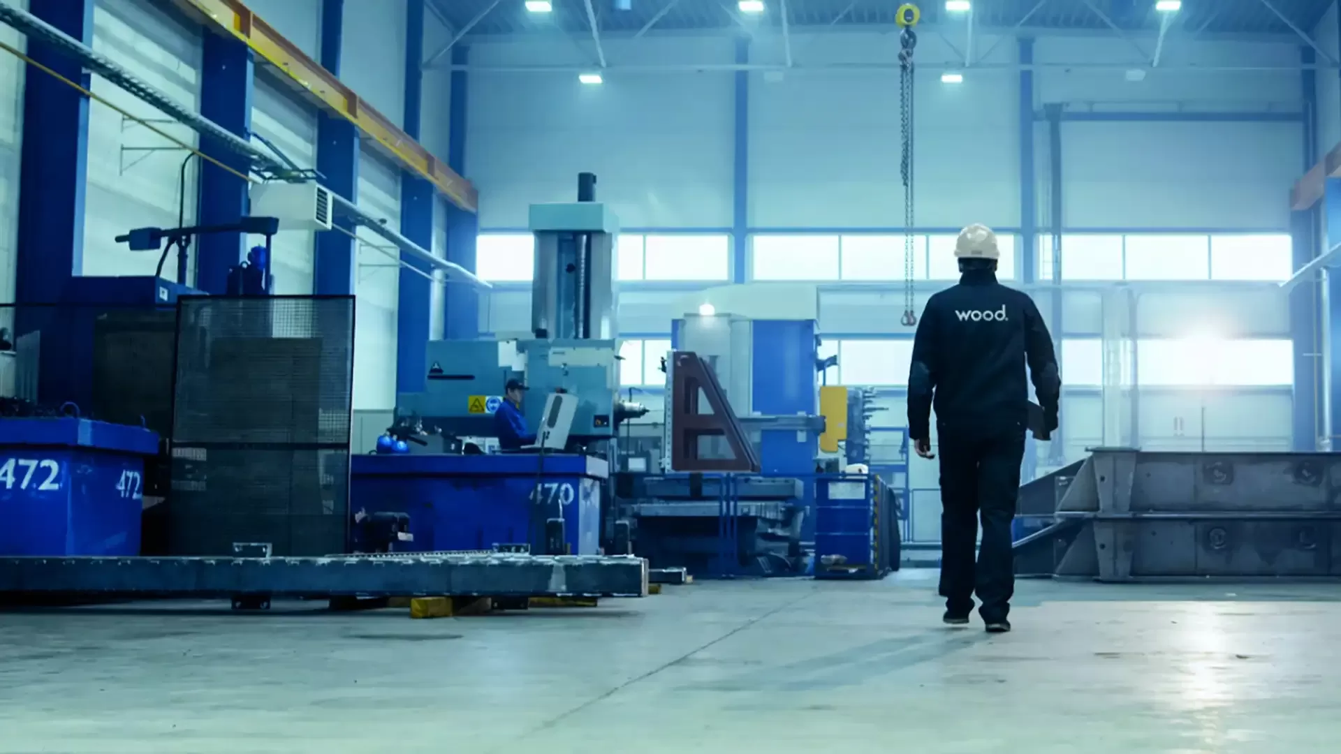 An engineer walking through an energy facility